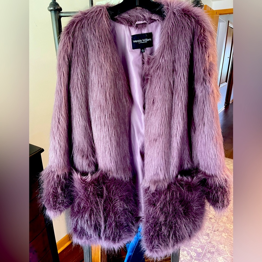 Purple coat with deep pockets and purple lining.  Awesome look! Unique! Warm!